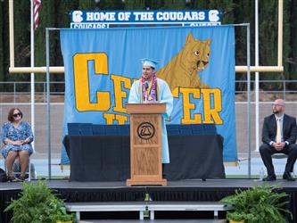 A student speaking during graduation